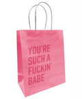 Pink shopping bag with text on a white background