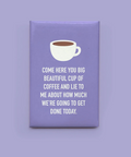 Fridge magnet with a coffee cup illustration and humorous text on a purple background