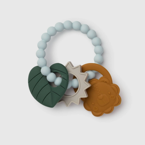 Silicone baby teether with a light blue beaded ring and three textured chewable pieces: a dark green leaf, a cream sun, and a brown lion face.
