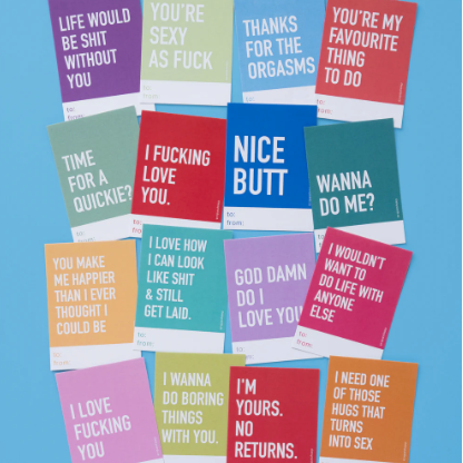 Collection of colorful cards with various intimate text phrases on a blue background