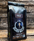 Coffin Creek Silver Bullet coffee bag on a wooden background