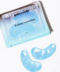 Blue eye masks with packaging labeled 'grace & stella' on a white background