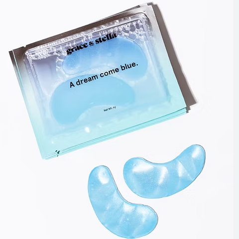 Blue eye masks with packaging labeled 'grace & stella' on a white background