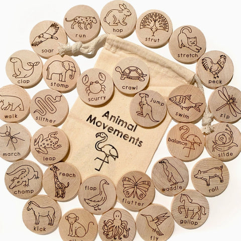 Wooden discs with animal illustrations and movements on a white background