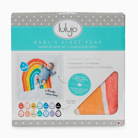 Lulujo baby's first year blanket and cards set packaging on a white background