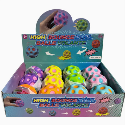 Box of high bounce balls with colorful design on a white background