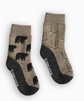 Two pairs of socks with bear and nature patterns on a white background