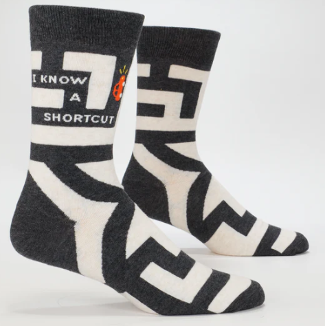Two socks with geometric patterns and text on a white background