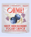 Packaging of OHME! freeze-dried blueberry yogurt crunch on a light purple background