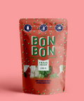 Red candy bag labeled 'Bon Bon' on a pink background