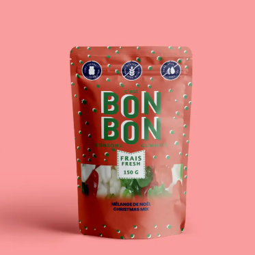 Red candy bag labeled 'Bon Bon' on a pink background