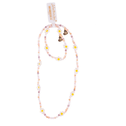 A pastel beaded necklace with daisy flowers and two small heart charms, shown on a white background with a product tag attached.