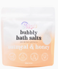 Bottle of bubbly bath salts with a gradient label from white to peach, featuring the brand 'Pompei'.