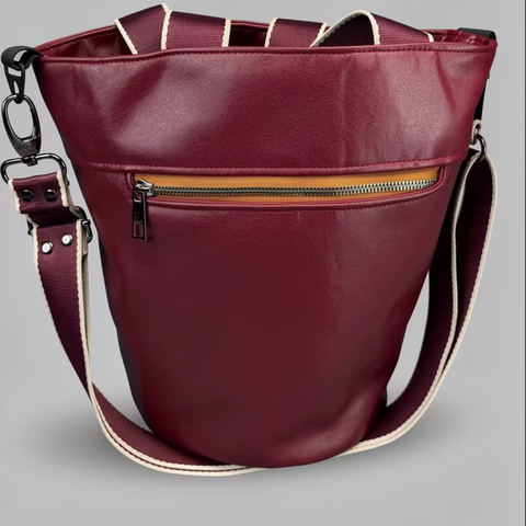 burgandy coloured tote bag with zipper pouch on front and shoulder straps