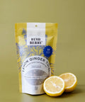 Tea package labeled 'Bush Berry' with lemon slices on a green background