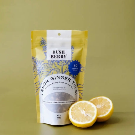 Tea package labeled 'Bush Berry' with lemon slices on a green background