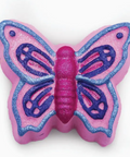 Pink butterfly-shaped object with blue accents on a white background