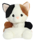 Plush toy cat with black, brown, and white fur on a white background