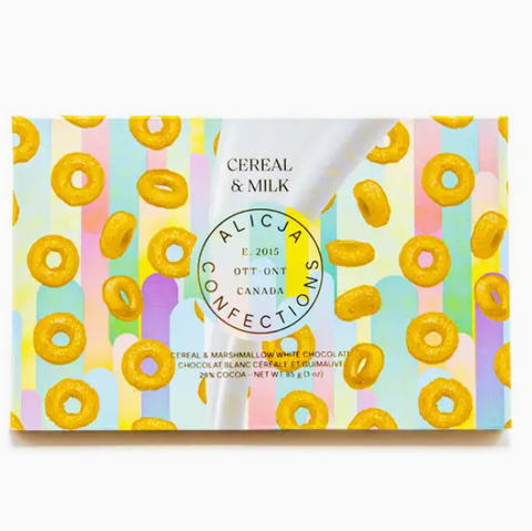 Candy bar packaging with cereal and milk design, featuring colorful stripes and a brand logo.