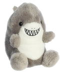 Plush shark toy with a happy expression on a white background