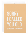 Beige card with white text apologizing for calling someone old