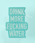 Mint green sticker with text 'DRINK MORE FUCKING WATER' on a light blue background