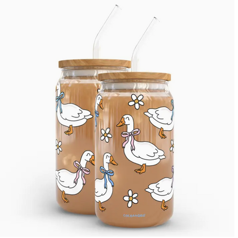 Two glass jars with wooden lids featuring duck illustrations on a white background