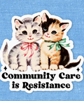 Two kittens with a 'Community Care is Resistance' text on a blue background