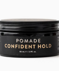 Black jar of pomade with 'Confident Hold' text on a white background
