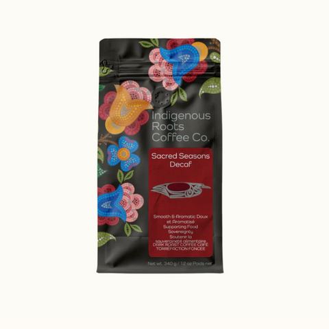 Indigenous Roots Coffee Co. coffee package with colorful floral designs on a white background