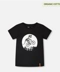 Black t-shirt with a dinosaur riding a bike graphic on a white background