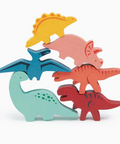 Set of colorful dinosaur toys on a white background