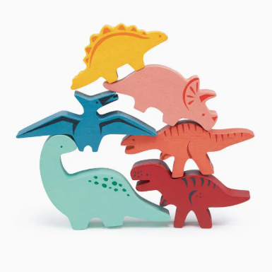 Set of colorful dinosaur toys on a white background