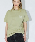 Person wearing a light green t-shirt with a logo on a white background