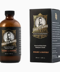 Brown bottle and black box of 'Educated Beards' grooming products on a white background