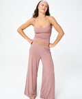 model wearing soft pink stretchy pants