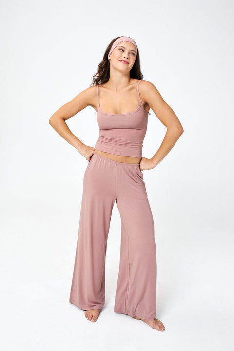model wearing soft pink stretchy pants