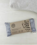 Amma lavender eye pillow on a white surface with packaging