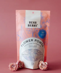 Flower Power tea package with pink roses on a pink background
