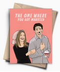 Card with cartoon illustration of a couple and text 'The One Where You Got Married' on a pink background.