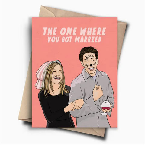 Card with cartoon illustration of a couple and text 'The One Where You Got Married' on a pink background.