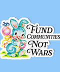 Sticker with a blue bunny holding a pink and yellow object, text 'Fund Communities Not Wars' on a light blue background.