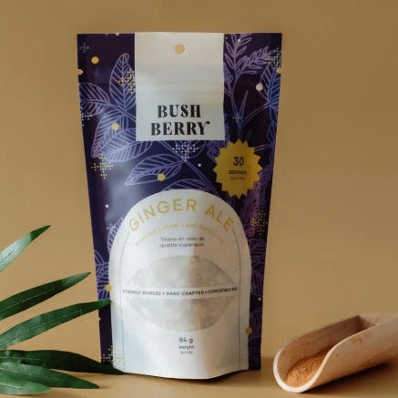 Packaged ginger ale with 'Bush Berry' branding on a beige background