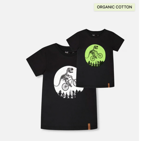 Two black t-shirts with graphic designs on a white background, labeled 'Organic Cotton'.