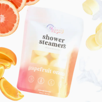 Pack of shower steamers with grapefruit and orange flavor on a white background