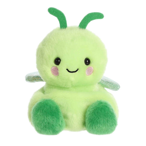 Green plush toy with a smiling face on a white background