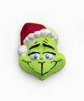 Green Grinch face ornament with a red Santa hat on a white background