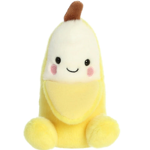 Plush toy shaped like a banana with a smiling face on a white background