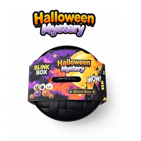 A Halloween mystery blink box product shown on a white background with a large 'Halloween Mystery' logo above it. The product is a round black basket with a colorful printed lid featuring purple clouds, a yellow moon, orange pumpkins, and a haunted house.