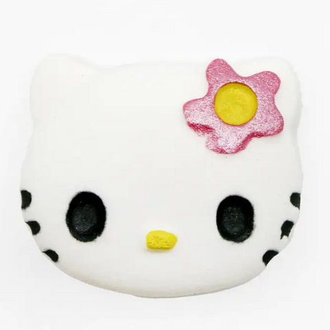 Plush toy with a flower on a white background